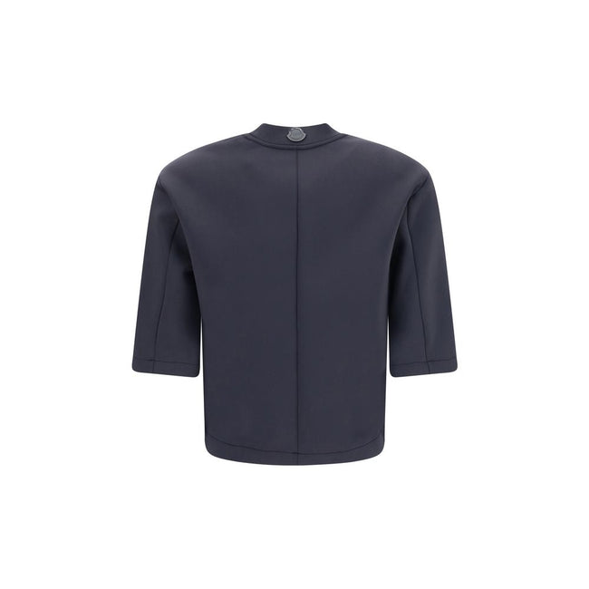 Black Polyester T-ShirtThe T-shirt by Moncler x EE72 by Edward Enninful embodies the understated elegance of the collection. Crafted from neoprene, it features a clean crew neck and short sleeves that enhance its modern silhouette. The design is completed