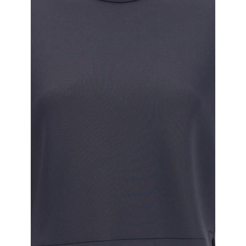 Black Polyester T-ShirtThe T-shirt by Moncler x EE72 by Edward Enninful embodies the understated elegance of the collection. Crafted from neoprene, it features a clean crew neck and short sleeves that enhance its modern silhouette. The design is completed