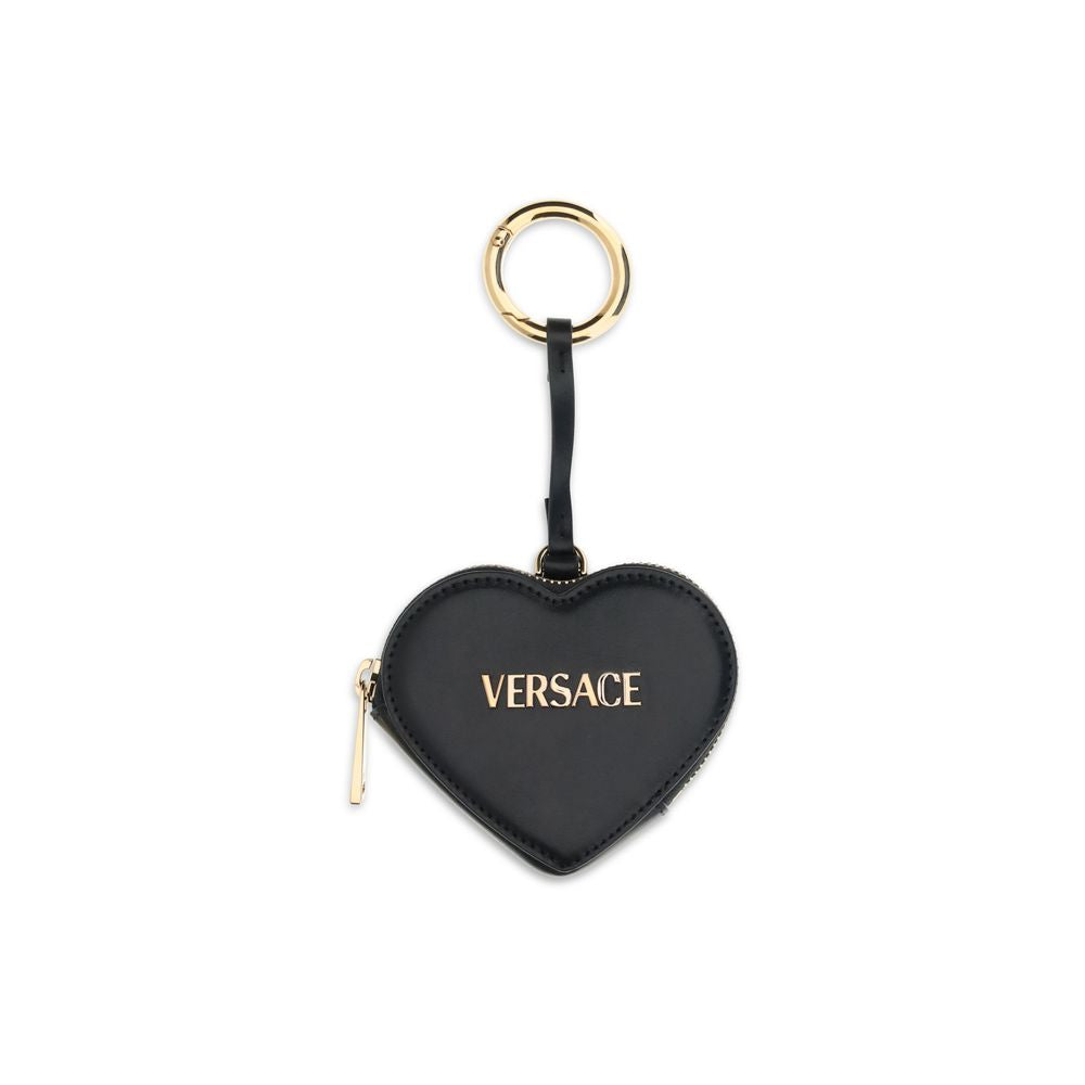 Black Leather WalletThe Zip Coin Purse by Versace is crafted from soft nappa leather and embellished with a metal Versace logo. It features the Versace logo lettering and a practical zip closure. Season: AW25 Dimension: 10x10x2.5 Composition: 100% Leather