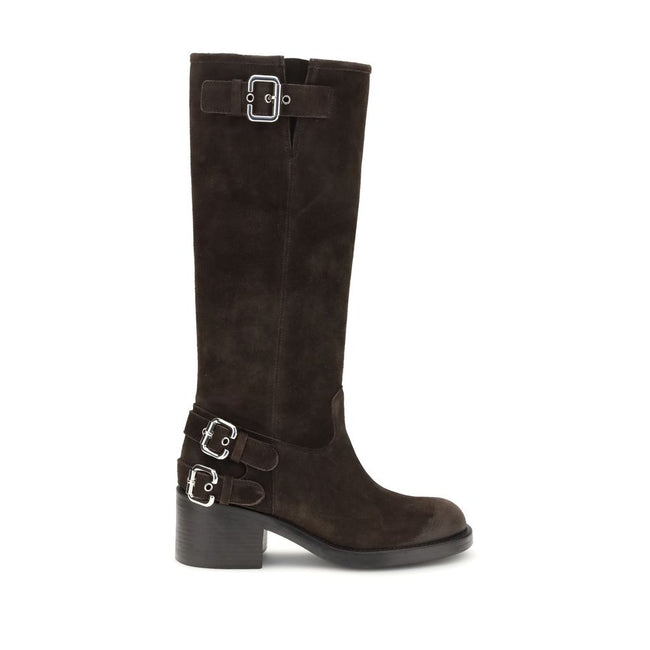 Brown Calf Leather Bos Taurus Lace-Up BootsThe Dakota Boots by Chloé are crafted from suede leather and inspired by the classic biker style. The sturdy rubber sole combines a tubular shaft with a comfortable stacked heel, while multiple silver-toned Paddi
