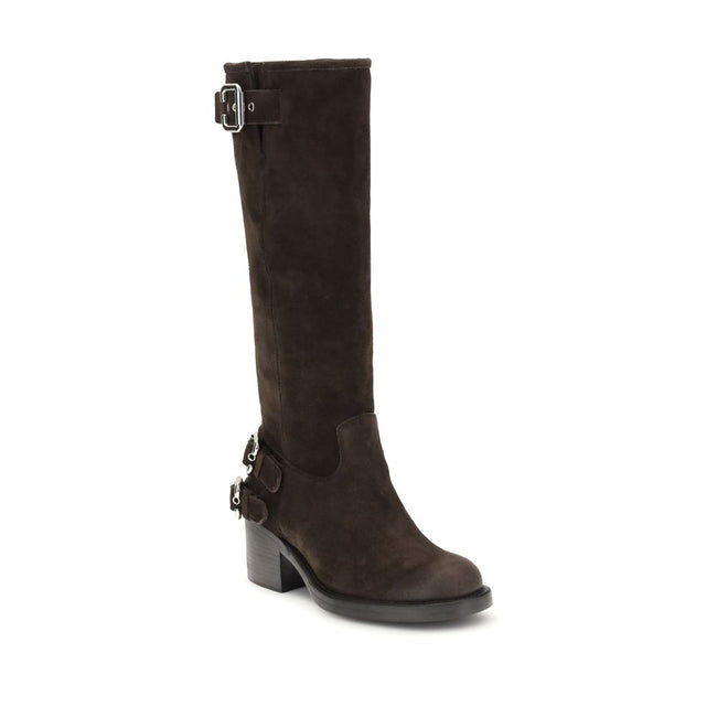 Brown Calf Leather Bos Taurus Lace-Up BootsThe Dakota Boots by Chloé are crafted from suede leather and inspired by the classic biker style. The sturdy rubber sole combines a tubular shaft with a comfortable stacked heel, while multiple silver-toned Paddi