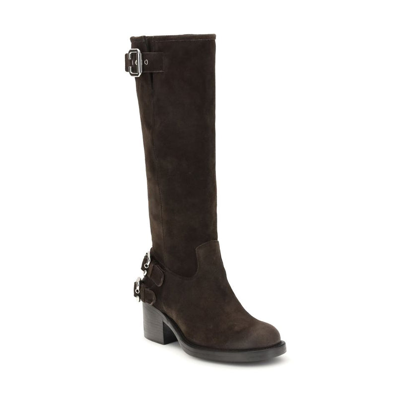 Brown Calf Leather Bos Taurus Lace-Up BootsThe Dakota Boots by Chloé are crafted from suede leather and inspired by the classic biker style. The sturdy rubber sole combines a tubular shaft with a comfortable stacked heel, while multiple silver-toned Paddi