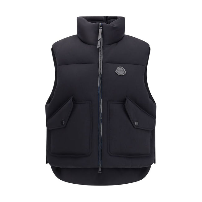 Black Polyamide Sleveless JacketThe Otis Padded Gilet from Moncler x EE72 by Edward Enninful blends style with functionality. Made from stretch cotton-blend technical jersey and nylon with a nylon laqué lining, it offers a lightweight yet durable structur