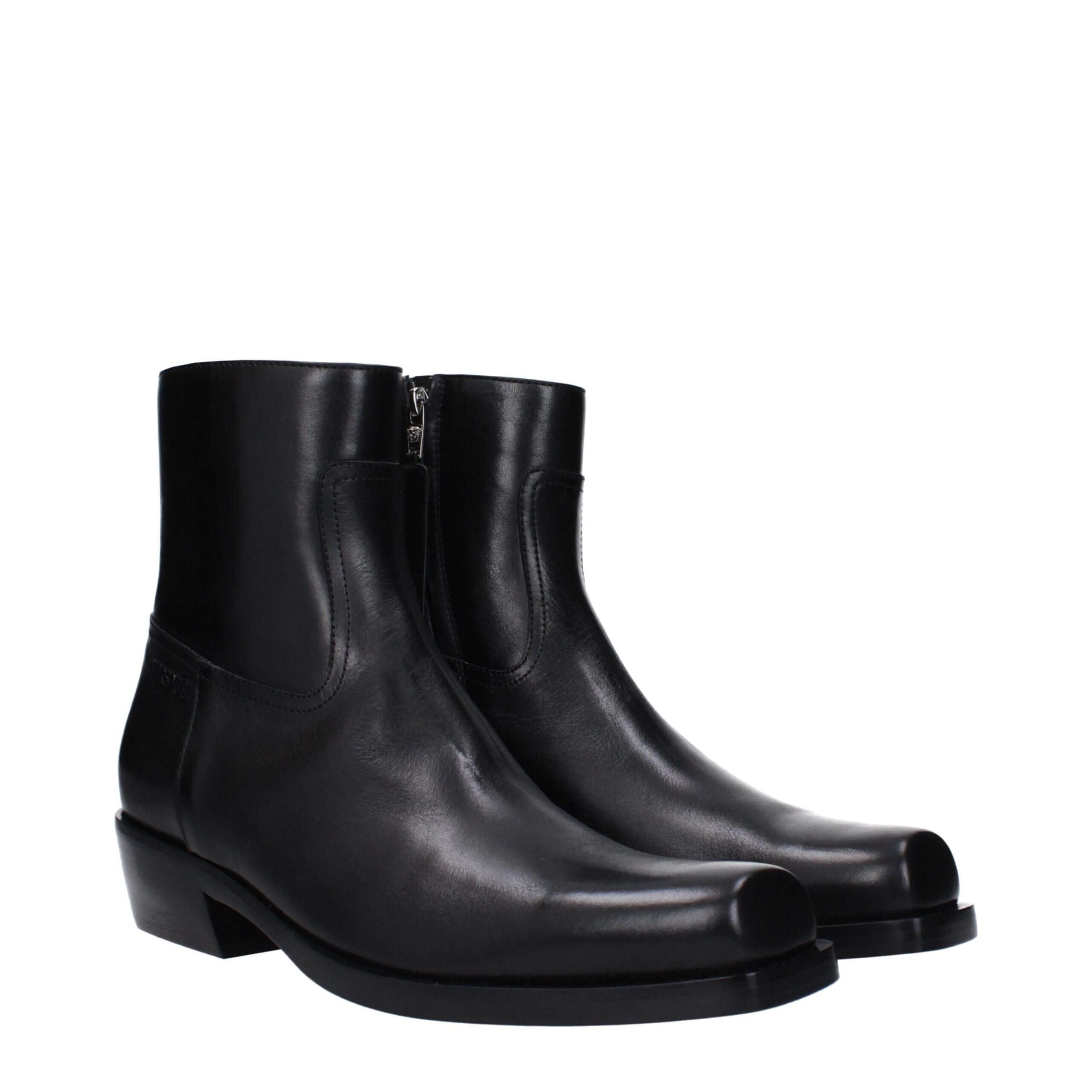 Black Leather Ankle BootsDescription: The product with MPN 10161571A110841B00E and code F82950 leather in black is a ankle boots designed by Versace. It has features like side logo. Additional Info: Style: Casual Closing type: Zip Closure Shoe sole: Leath