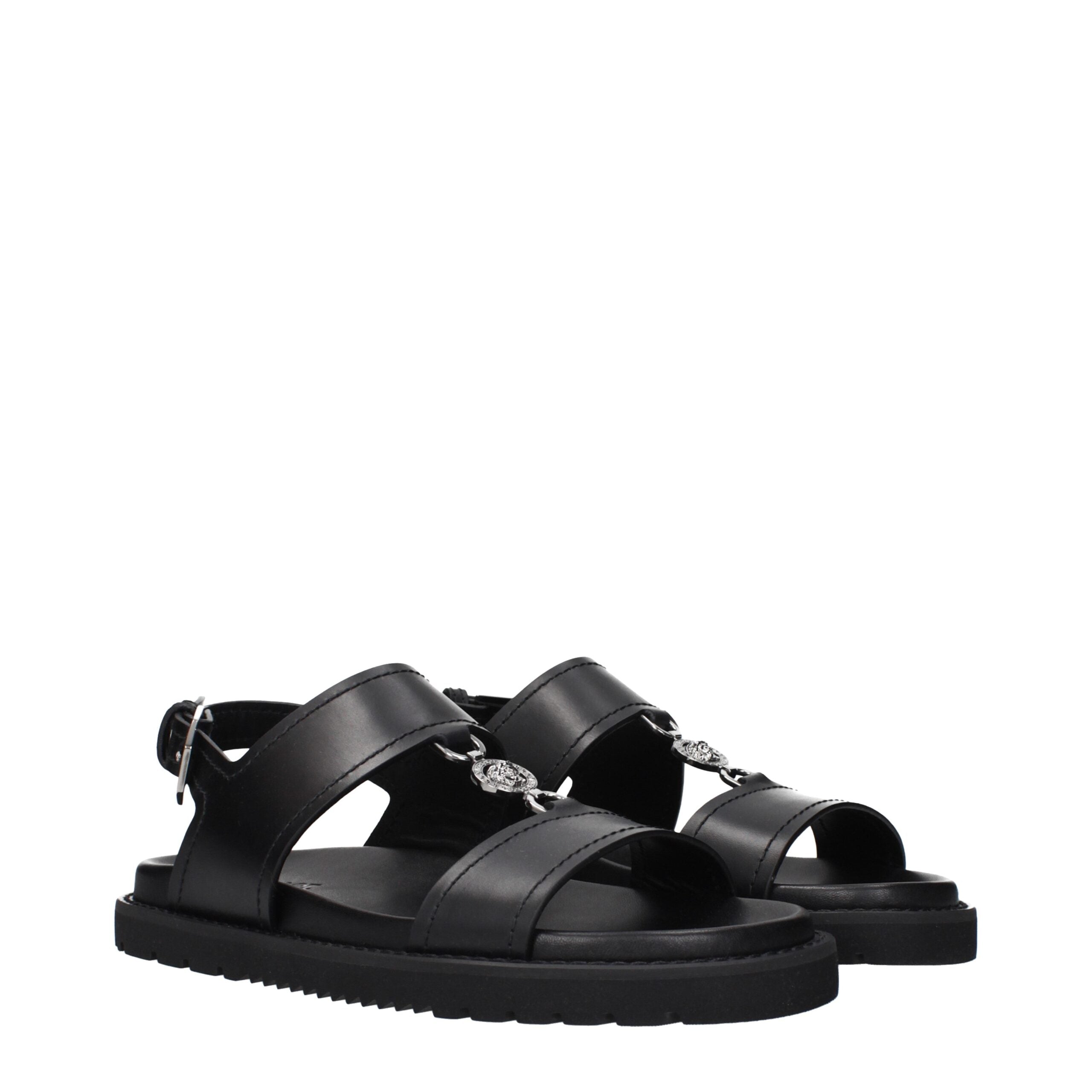 Black Leather Flat SandalsDescription: The product with MPN 10176071A135121B00E and code F84907 leather in black is a sandals designed by Versace. It has features like front detail.Black Leather Flat Sandals${tagsVersaceAulae Black Leather Flat Sandals Ve
