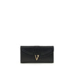 Black Calf Leather Bos Taurus WalletThe chain Wallet by Versace combines functionality and style in a compact and sophisticated design. Crafted from grained calfskin, it features a magnetic closure with a leather-covered V initial and antiqued brass-finis