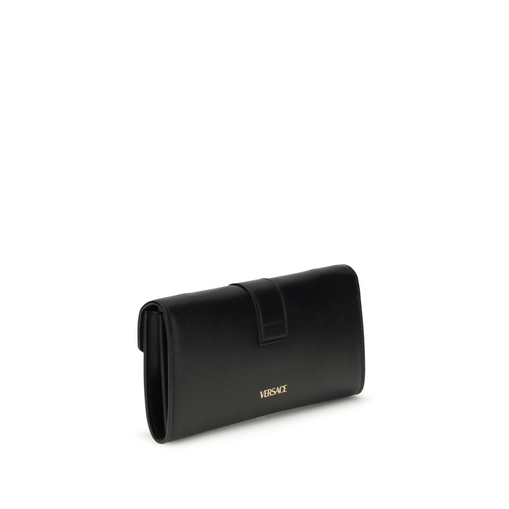Black Calf Leather Bos Taurus WalletThe chain Wallet by Versace combines functionality and style in a compact and sophisticated design. Crafted from grained calfskin, it features a magnetic closure with a leather-covered V initial and antiqued brass-finis