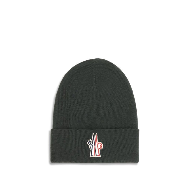 Black Fleece Wool BeanieBeanie Hat by Moncler Grenoble is made of extra fine wool yarn, offering warmth and comfort ideal for the winter season. Featuring a 7-fine rib knit, it has an essential design enhanced by the logo patch applied on the front for a