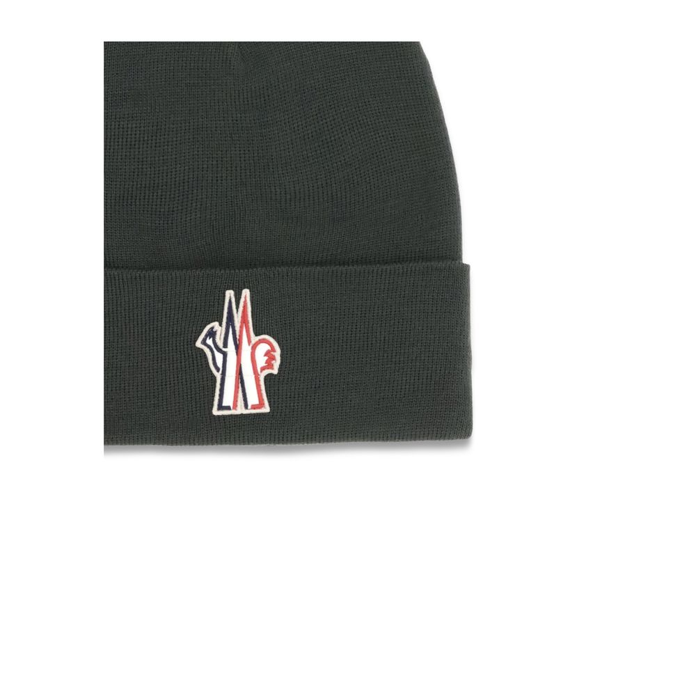 Black Fleece Wool BeanieBeanie Hat by Moncler Grenoble is made of extra fine wool yarn, offering warmth and comfort ideal for the winter season. Featuring a 7-fine rib knit, it has an essential design enhanced by the logo patch applied on the front for a