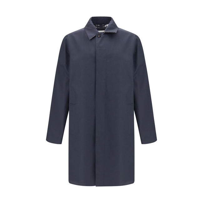 Blue Cotton CoatThe Camden Heritage Coat by Burberry is the original car coat, crafted in England from shower-resistant cotton gabardine. Part of the Heritage Collection, it features a mid-length cut with a regular fit and raglan sleeves. The single-breas