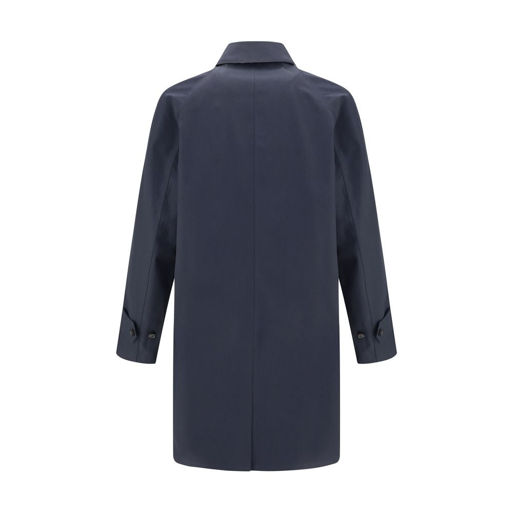 Blue Cotton CoatThe Camden Heritage Coat by Burberry is the original car coat, crafted in England from shower-resistant cotton gabardine. Part of the Heritage Collection, it features a mid-length cut with a regular fit and raglan sleeves. The single-breas
