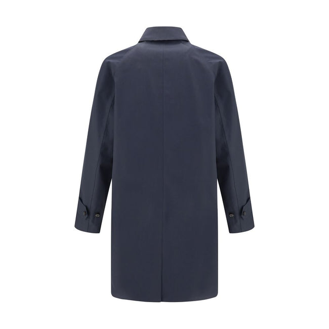Blue Cotton CoatThe Camden Heritage Coat by Burberry is the original car coat, crafted in England from shower-resistant cotton gabardine. Part of the Heritage Collection, it features a mid-length cut with a regular fit and raglan sleeves. The single-breas