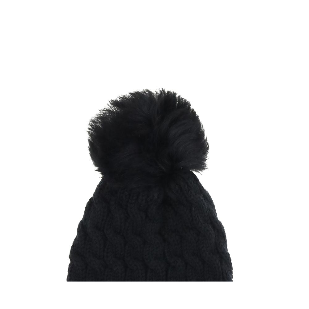Black Fleece Wool BeanieBeanie Hat by Moncler Grenoble is made of extra fine wool yarn, ideal for ensuring warmth and comfort during the cold season. Distinguished by a refined braided knit with fineness 3, it is embellished with a matching pom-pom and co