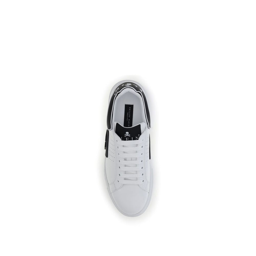 White Calf Leather Bos Taurus Athletic SneakersLow Top Hexagon Sneakers by Philipp Plein combine urban style and advanced technology in a bold, modern design. Made of nappa leather, they are embellished with a contrasting logo on the collar and the iconic