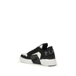 Black Calf Leather Bos Taurus Low Top SneakersPhantom Cocco Sneakers by Philipp Plein combine elegance and originality in a model also designed for moments of relaxation. Made of leather with crocodile-effect print, they are enriched with suede details an