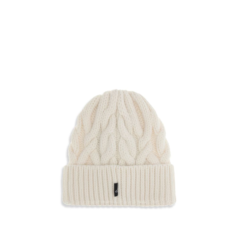 White Fleece Wool BeanieBeanie Hat by Moncler Grenoble is made of extra fine wool yarn, perfect for providing warmth and comfort during the cold season. Characterized by a refined braided knit with fineness 3, it is completed by the iconic logo patch, a d