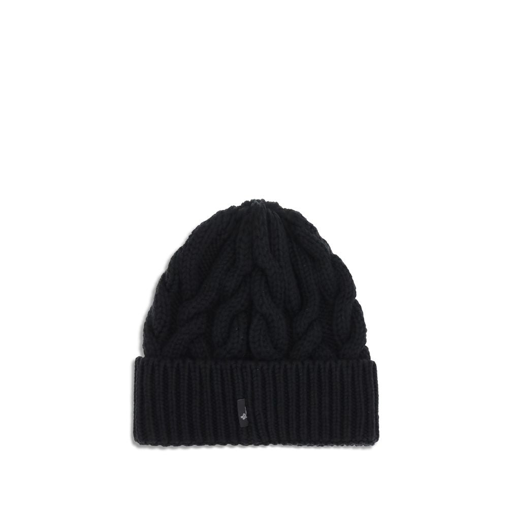 Black Fleece Wool BeanieBeanie Hat by Moncler Grenoble is made of extra fine wool yarn, perfect for providing warmth and comfort during the cold season. Characterized by a refined braided knit with fineness 3, it is completed by the iconic logo patch, a d