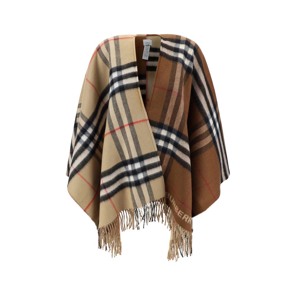 Brown Cashmere CoatMerino Wool Cape by Burberry, the brand’s iconic Archival Check pattern, frayed hems, contrasting printed brand monogram on front, shawl lapels on front. Season: AW25 Composition: 49% Kashmir/capra Hircus 51% Merino Wool MADE IN GREAT B