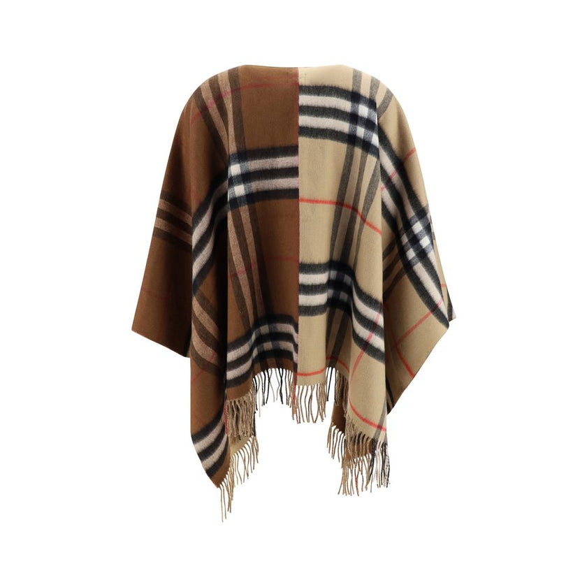 Brown Cashmere CoatMerino Wool Cape by Burberry, the brand’s iconic Archival Check pattern, frayed hems, contrasting printed brand monogram on front, shawl lapels on front. Season: AW25 Composition: 49% Kashmir/capra Hircus 51% Merino Wool MADE IN GREAT B