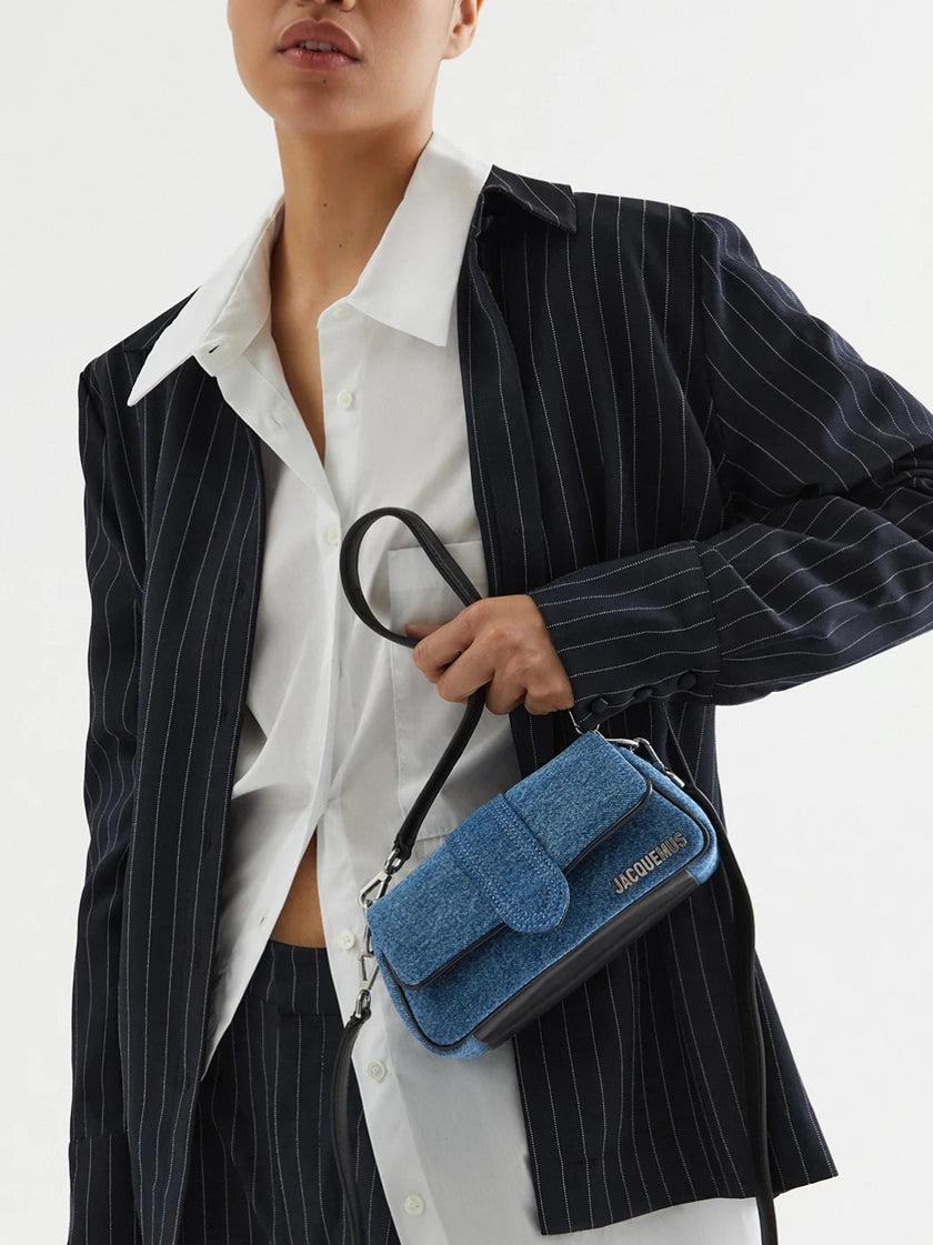 Denim Le Bambimou Petit HandbagJACQUEMUS Gorgeous brand new, 100% Authentic Jacquemus Denim Le Bambimou Petit Handbag. Model: 241BA388-3176 Color: Denim with Silver Hardware Material: Cotton and Leather – Adjustable shoulder strap – Small handle – Removab