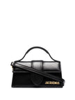 Black Le Bambino HandbagJACQUEMUS Gorgeous brand new, 100% Authentic Jacquemus Le Bambino Black Bag. Model: 213BA006-3000 Color: Black with Gold Hardware Material: Leather Bag with adjustable shoulder strap – Small handle – Removable shoulder strap – Card