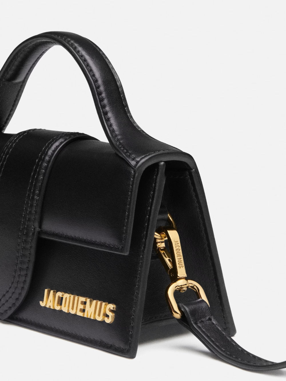 Black Le Bambino HandbagJACQUEMUS Gorgeous brand new, 100% Authentic Jacquemus Le Bambino Black Bag. Model: 213BA006-3000 Color: Black with Gold Hardware Material: Leather Bag with adjustable shoulder strap – Small handle – Removable shoulder strap – Card