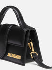Black Le Bambino HandbagJACQUEMUS Gorgeous brand new, 100% Authentic Jacquemus Le Bambino Black Bag. Model: 213BA006-3000 Color: Black with Gold Hardware Material: Leather Bag with adjustable shoulder strap – Small handle – Removable shoulder strap – Card