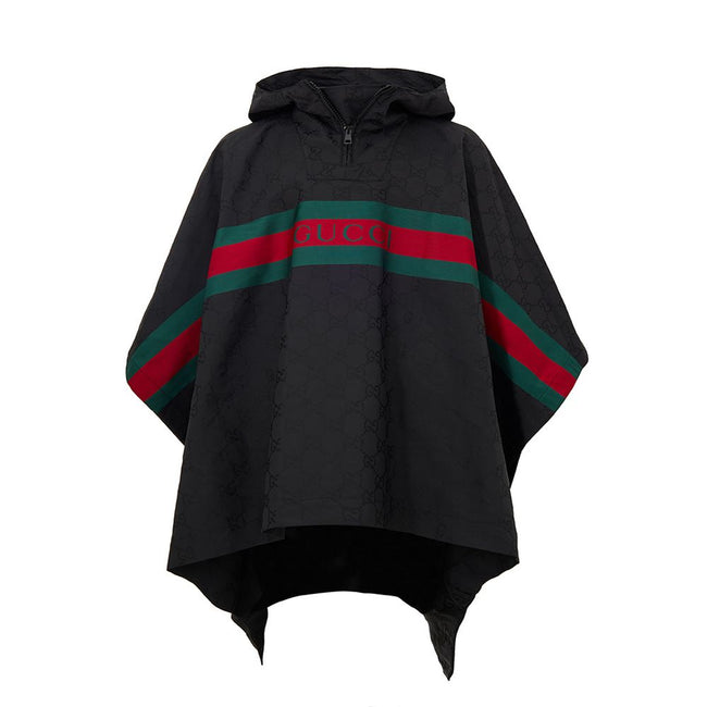 Black Polyester Trench CoatBlack Cape with Web Logo and Gucci GG Monogram Print. In black technical fabric, allover logo, maxi contrasting Gucci Web Logo on the front, adjustable hood and half zip on the front. Buttons on the sides to adjust the fit, adju