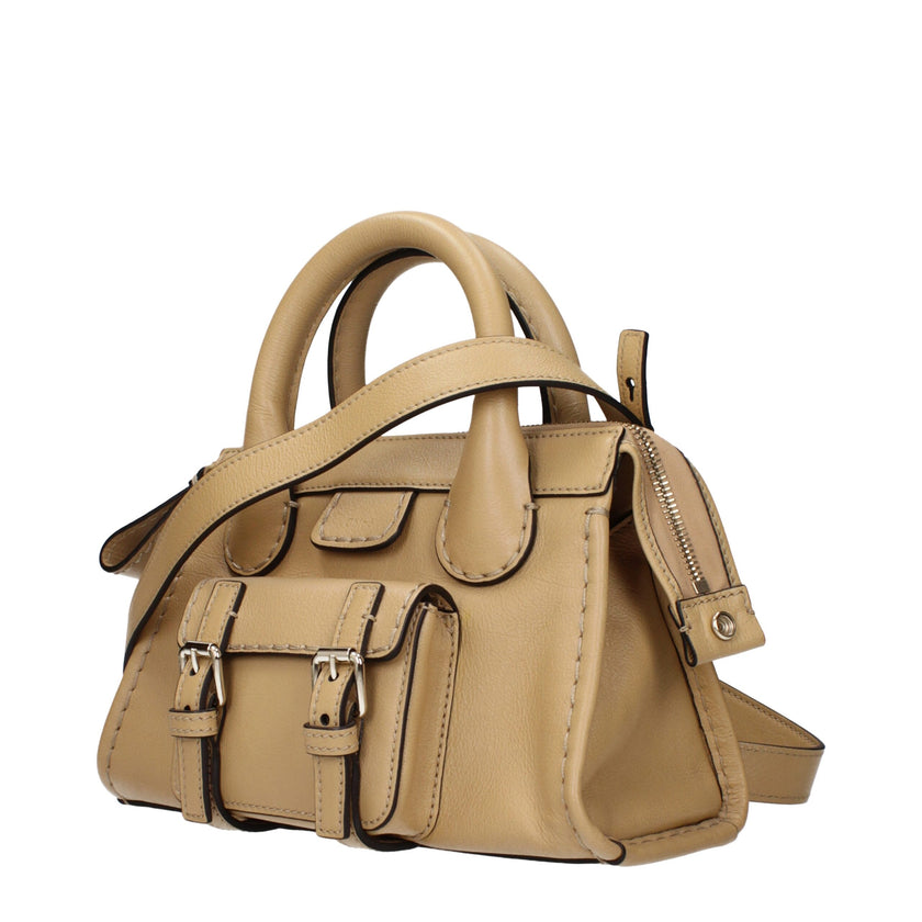 Beige Leather HandbagDescription: The product with MPN CHC21WS451F43275 and code F84922 leather in beige is a handbags designed by Chloé. It has features like front logo, adjustable shoulder, removable shoulder.Beige Leather Handbag${tagsChloéAulae Beige