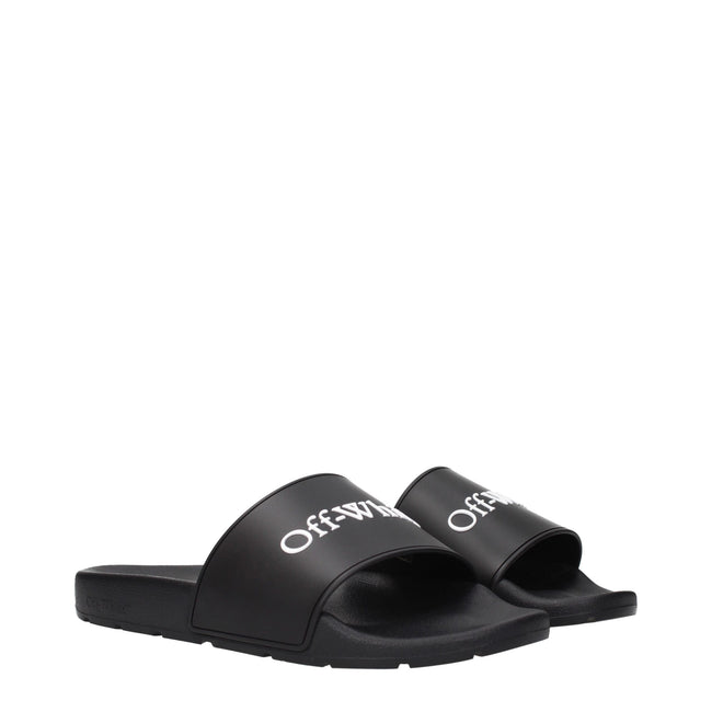 Black Cotton SlippersDescription: The product with MPN OMIU002MAT0011001 and code F84958 rubber in black is a slippers and clogs designed by Off-White. It has features like front logo.Black Cotton Slippers${tagsOff-WhiteAulae Black Cotton Slippers Off-Whi
