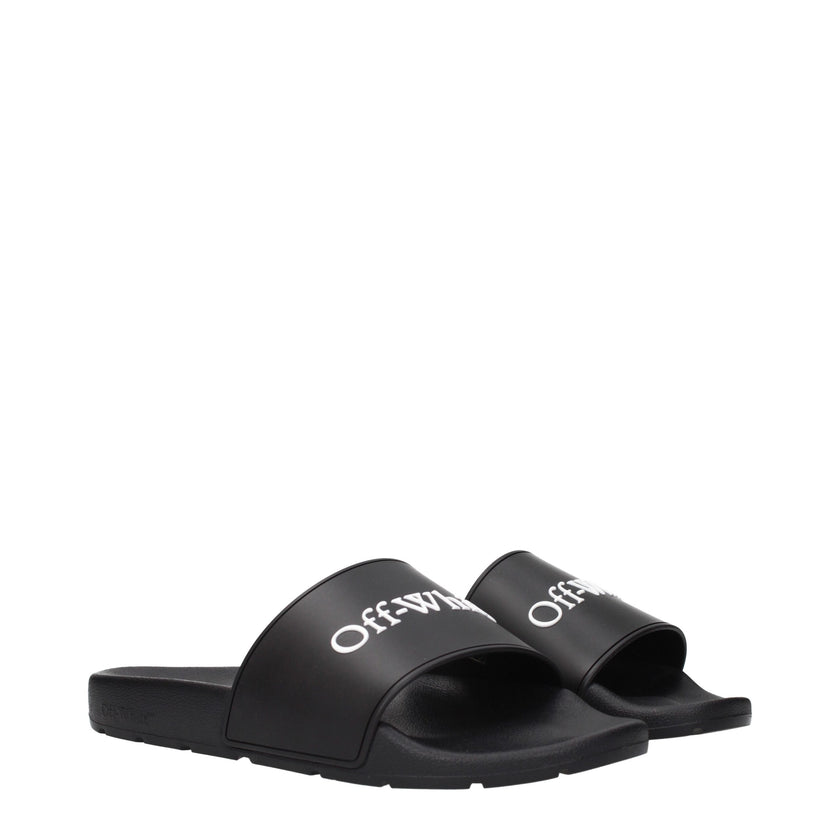 Black Cotton SlippersDescription: The product with MPN OMIU002MAT0011001 and code F84958 rubber in black is a slippers and clogs designed by Off-White. It has features like front logo.Black Cotton Slippers${tagsOff-WhiteAulae Black Cotton Slippers Off-Whi