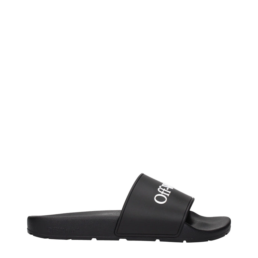 Black Cotton SlippersDescription: The product with MPN OWIU001MAT0011001 and code F84957 rubber in black is a slippers and clogs designed by Off-White. It has features like front logo.Black Cotton Slippers${tagsOff-WhiteAulae Black Cotton Slippers Off-Whi