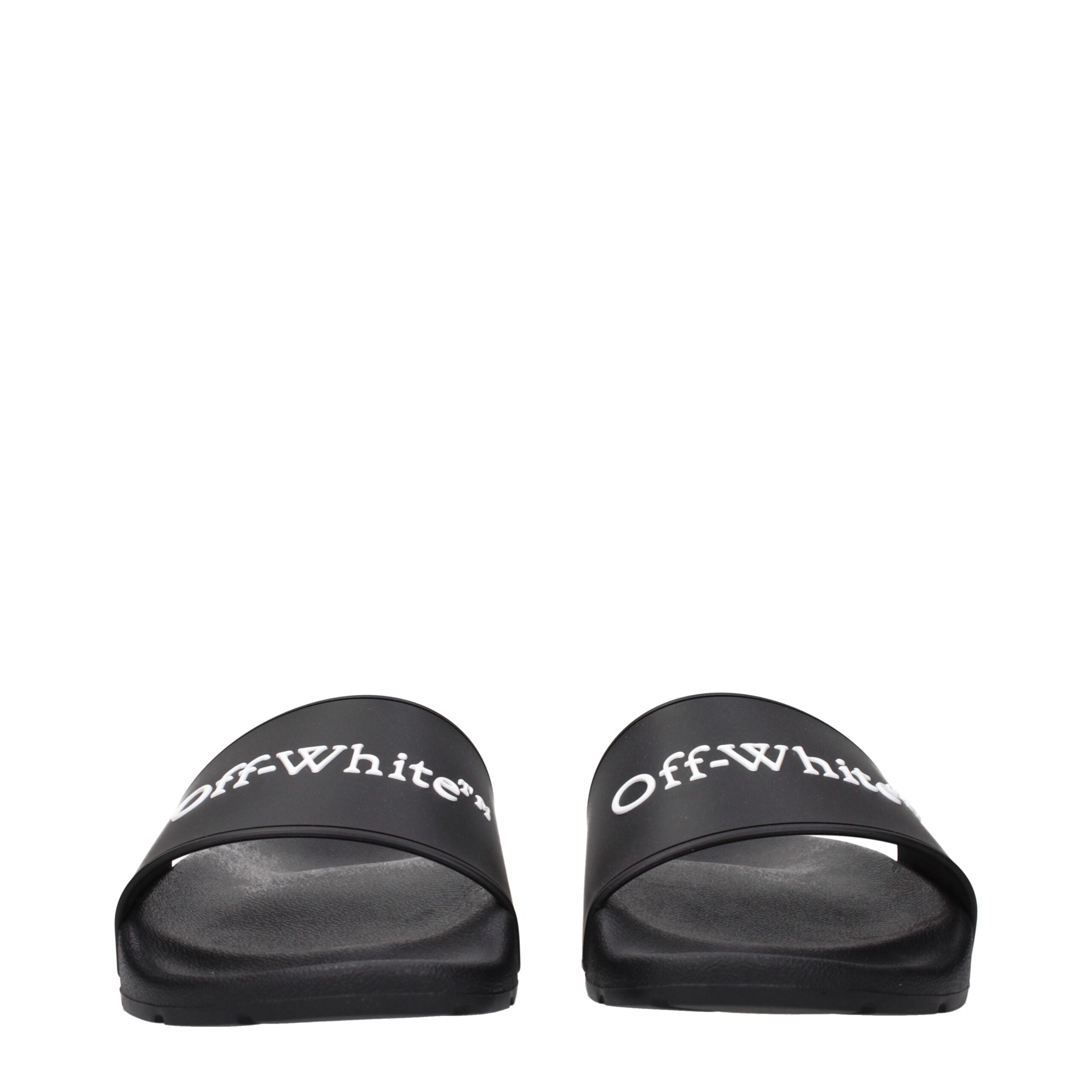 Black Cotton SlippersDescription: The product with MPN OMIU002MAT0011001 and code F84958 rubber in black is a slippers and clogs designed by Off-White. It has features like front logo.Black Cotton Slippers${tagsOff-WhiteAulae Black Cotton Slippers Off-Whi