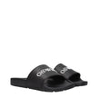 Black Cotton SlippersDescription: The product with MPN OWIU001MAT0011001 and code F84957 rubber in black is a slippers and clogs designed by Off-White. It has features like front logo.Black Cotton Slippers${tagsOff-WhiteAulae Black Cotton Slippers Off-Whi