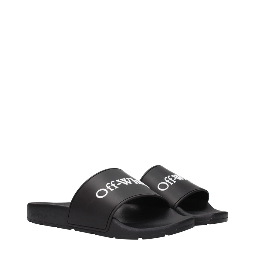 Black Cotton SlippersDescription: The product with MPN OWIU001MAT0011001 and code F84957 rubber in black is a slippers and clogs designed by Off-White. It has features like front logo.Black Cotton Slippers${tagsOff-WhiteAulae Black Cotton Slippers Off-Whi