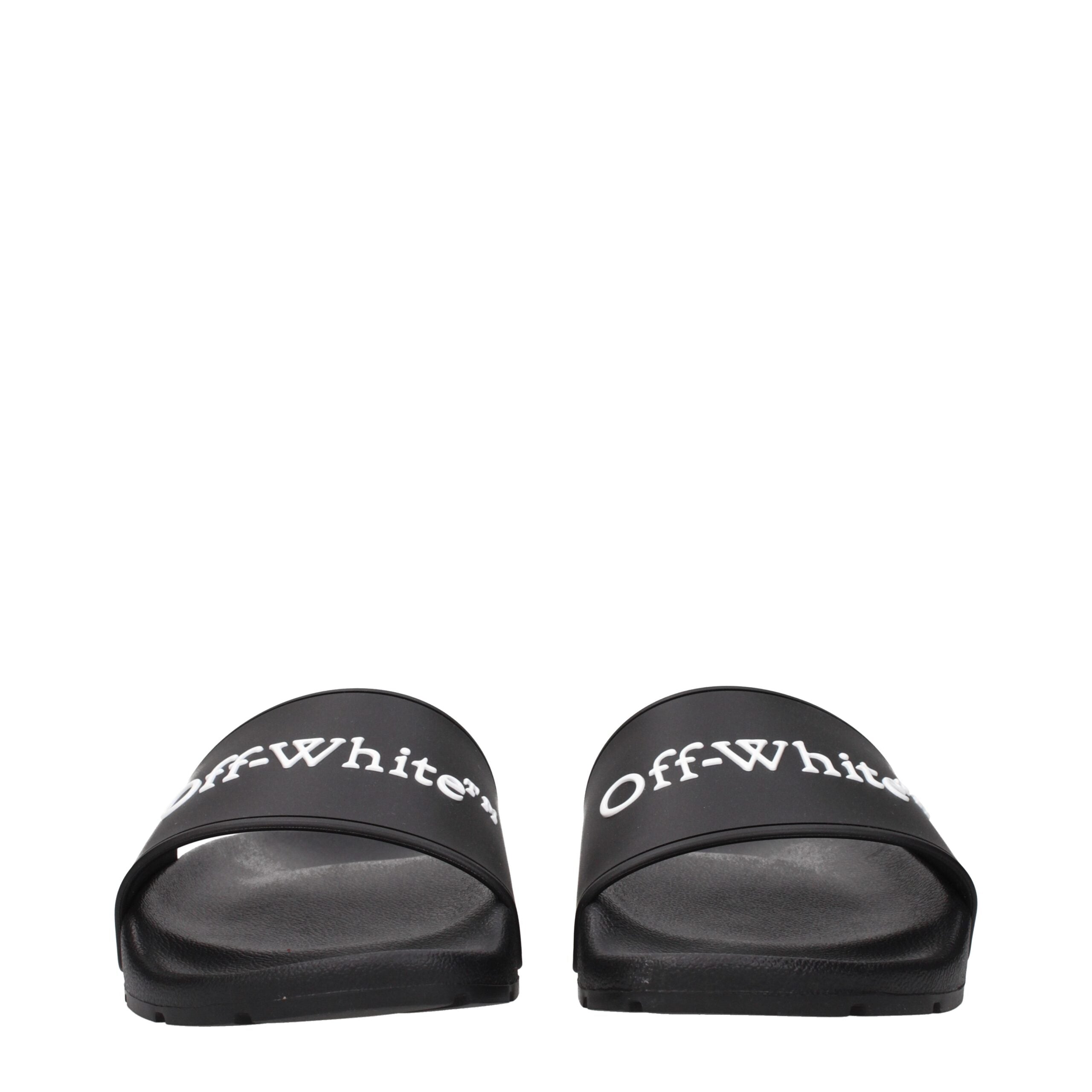 Black Cotton SlippersDescription: The product with MPN OWIU001MAT0011001 and code F84957 rubber in black is a slippers and clogs designed by Off-White. It has features like front logo.Black Cotton Slippers${tagsOff-WhiteAulae Black Cotton Slippers Off-Whi