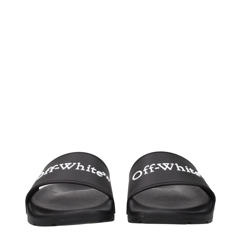 Black Cotton SlippersDescription: The product with MPN OWIU001MAT0011001 and code F84957 rubber in black is a slippers and clogs designed by Off-White. It has features like front logo.Black Cotton Slippers${tagsOff-WhiteAulae Black Cotton Slippers Off-Whi