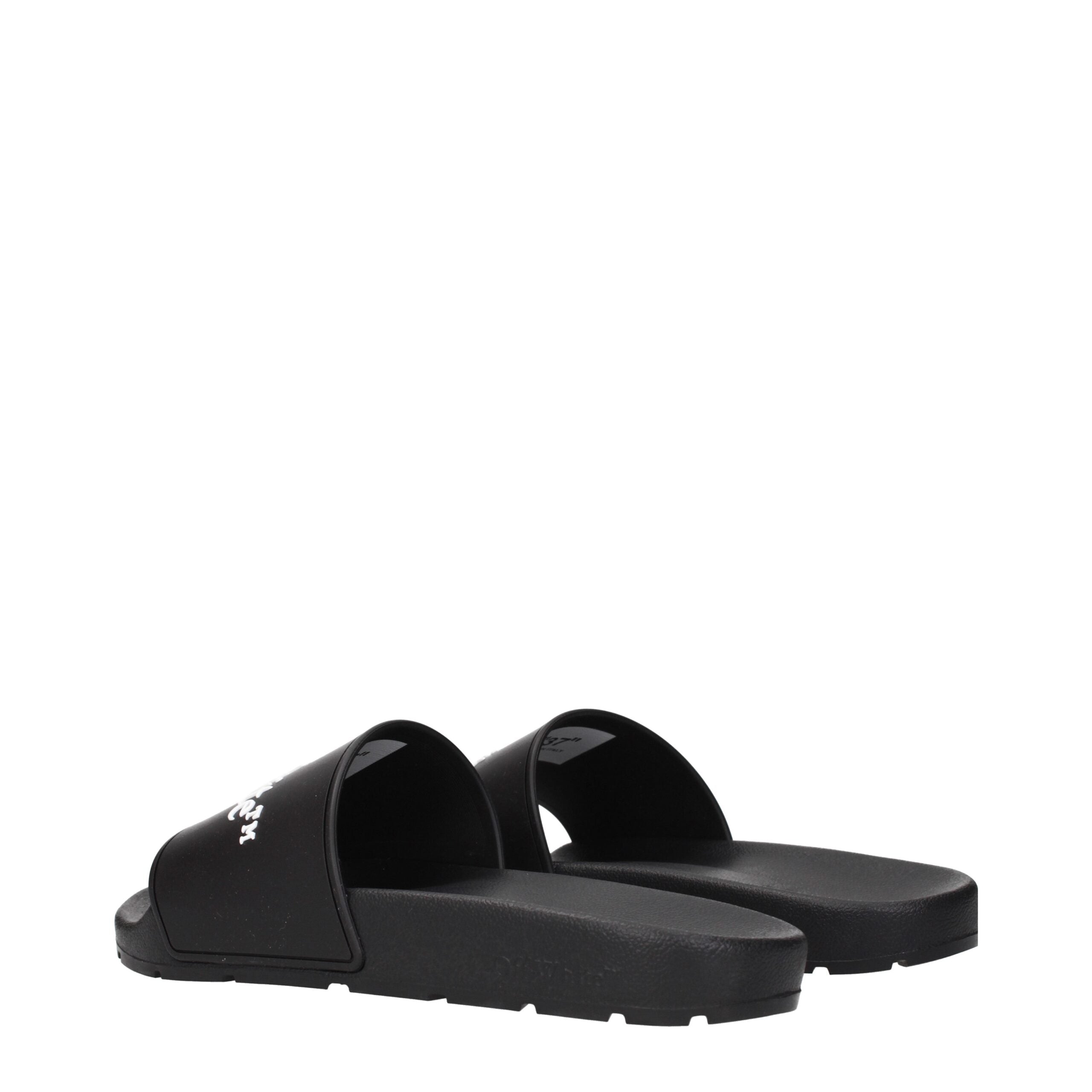 Black Cotton SlippersDescription: The product with MPN OWIU001MAT0011001 and code F84957 rubber in black is a slippers and clogs designed by Off-White. It has features like front logo.Black Cotton Slippers${tagsOff-WhiteAulae Black Cotton Slippers Off-Whi