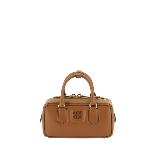 Arcadie HandbagLeather Arcadie Handbag by Miu Miu, double rigid and tubular handles at top, top zipper closure, iconic brand monogram press-stamped on front, single interior compartment, removable and adjustable flat leather shoulder strap. Season: AW25 D