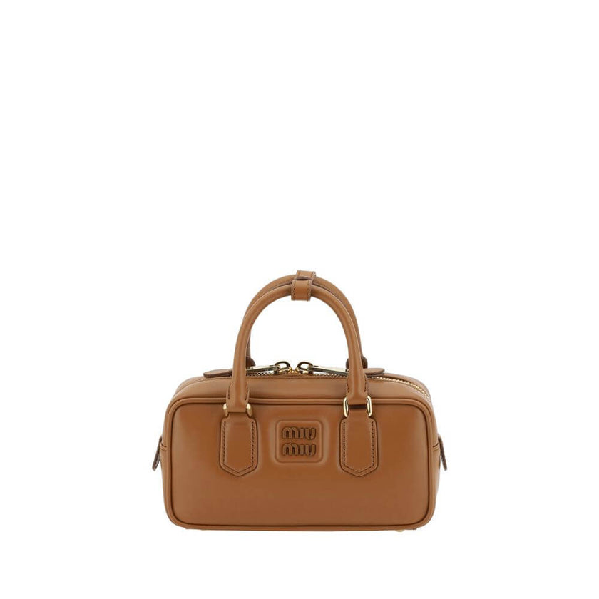 Arcadie HandbagLeather Arcadie Handbag by Miu Miu, double rigid and tubular handles at top, top zipper closure, iconic brand monogram press-stamped on front, single interior compartment, removable and adjustable flat leather shoulder strap. Season: AW25 D