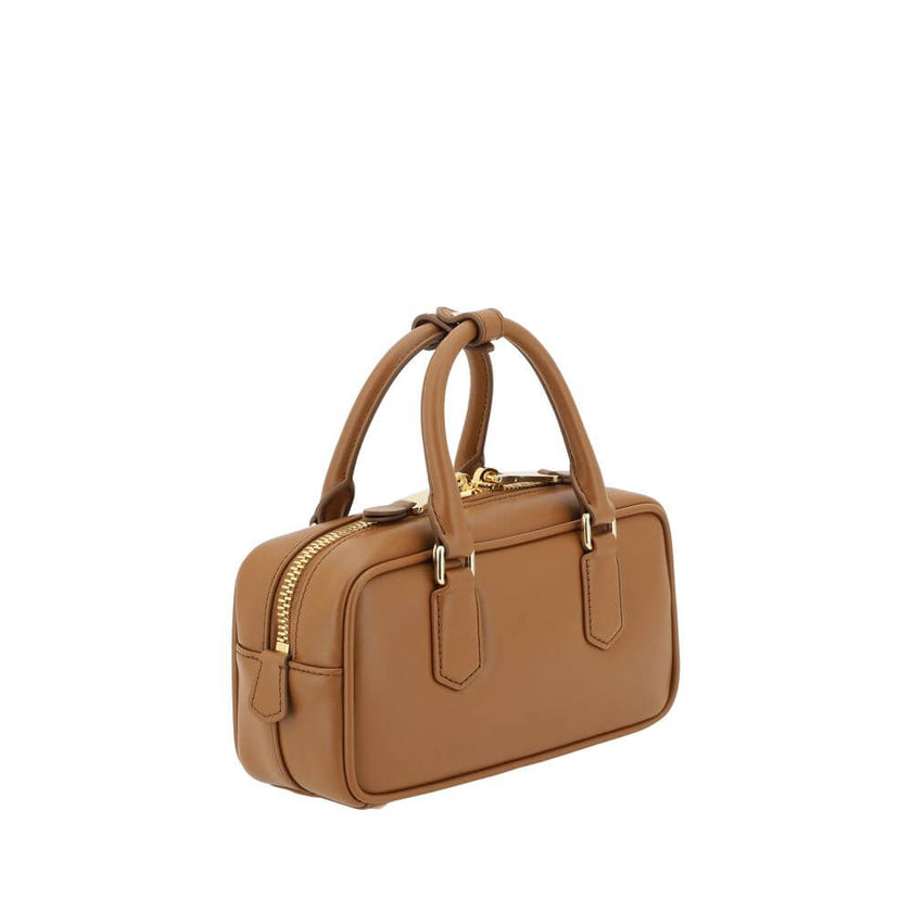 Arcadie HandbagLeather Arcadie Handbag by Miu Miu, double rigid and tubular handles at top, top zipper closure, iconic brand monogram press-stamped on front, single interior compartment, removable and adjustable flat leather shoulder strap. Season: AW25 D