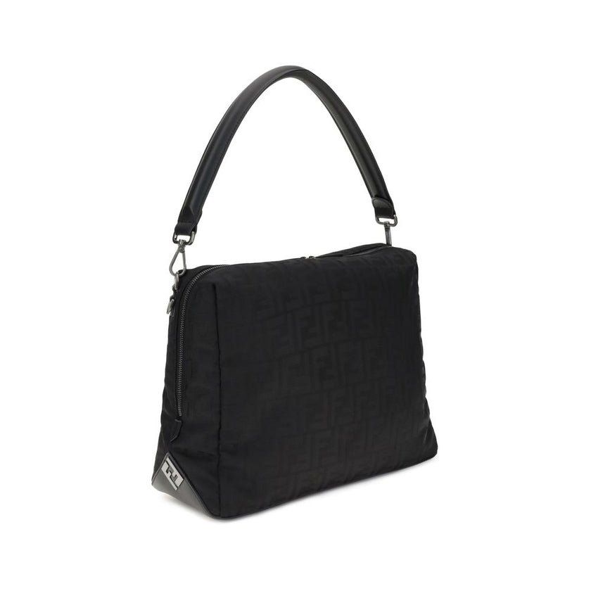 Black Polyamide Shoulder BagLui large Shoulder Bag by Fendi is an accessory with a contemporary design and soft construction, designed to combine style and functionality. Made of black padded FF nylon with a shiny, slightly embossed texture, it is finishe