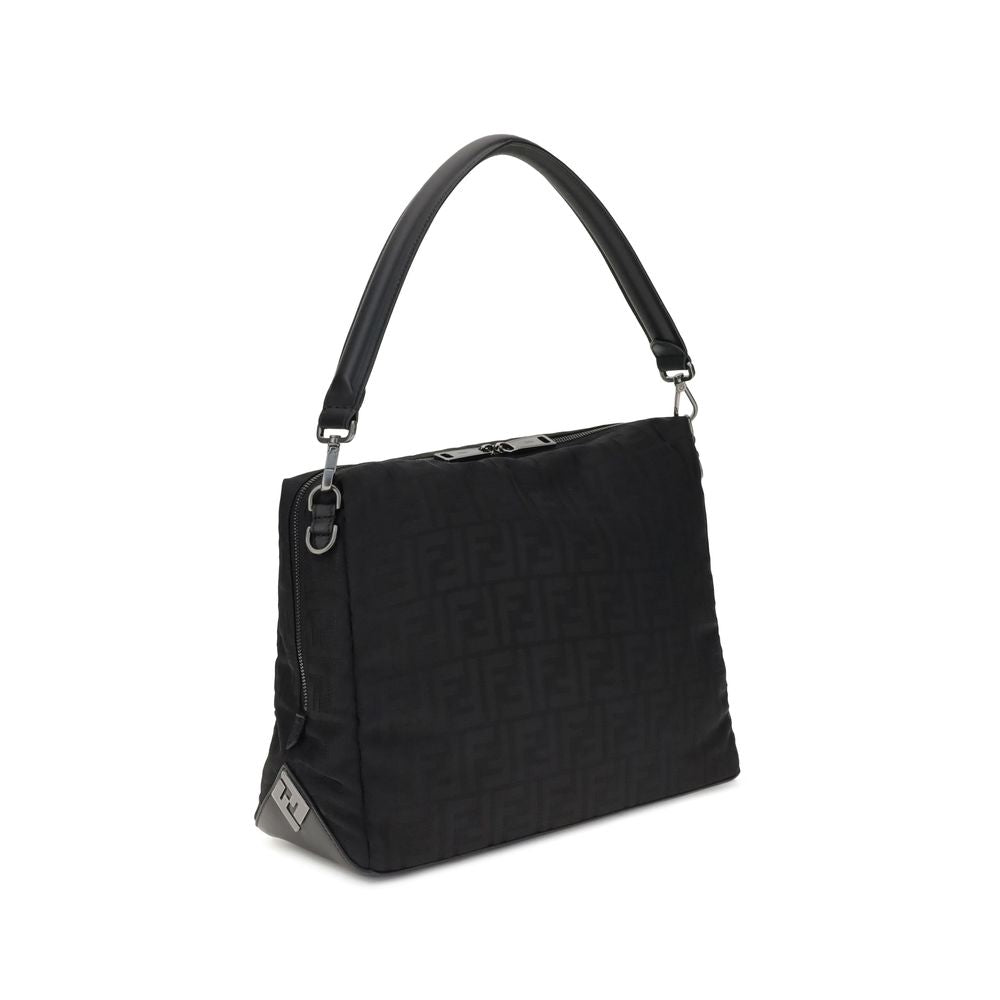 Black Polyamide Shoulder BagLui large Shoulder Bag by Fendi is an accessory with a contemporary design and soft construction, designed to combine style and functionality. Made of black padded FF nylon with a shiny, slightly embossed texture, it is finishe