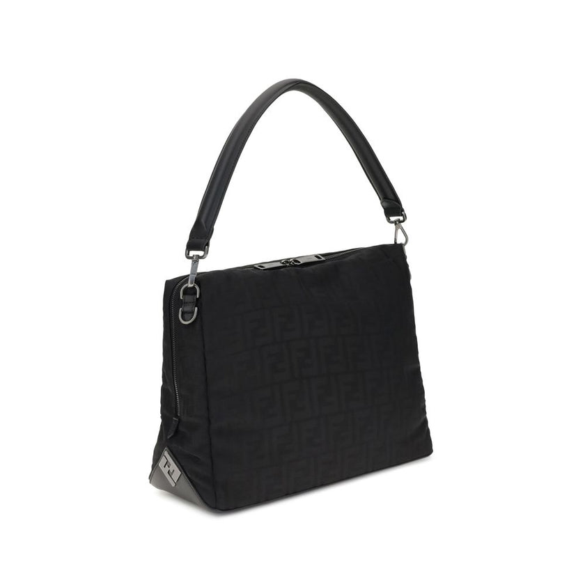 Black Polyamide Shoulder BagLui large Shoulder Bag by Fendi is an accessory with a contemporary design and soft construction, designed to combine style and functionality. Made of black padded FF nylon with a shiny, slightly embossed texture, it is finishe