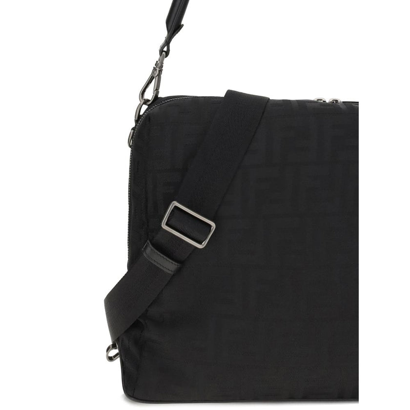 Black Polyamide Shoulder BagLui large Shoulder Bag by Fendi is an accessory with a contemporary design and soft construction, designed to combine style and functionality. Made of black padded FF nylon with a shiny, slightly embossed texture, it is finishe
