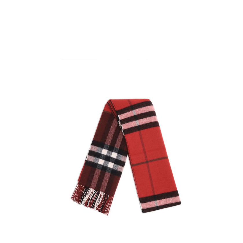 Bordeaux Cashmere ScarfCashmere Check Scarf by Burberry is an iconic accessory that combines tradition and sophistication. Rectangular in shape, it is made of fine cashmere with the house’s unmistakable check pattern. Fringing at the ends adds dynamic det