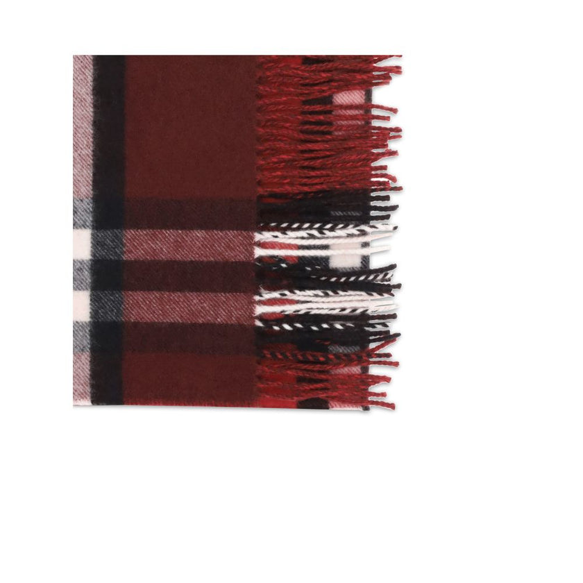 Bordeaux Cashmere ScarfCashmere Check Scarf by Burberry is an iconic accessory that combines tradition and sophistication. Rectangular in shape, it is made of fine cashmere with the house’s unmistakable check pattern. Fringing at the ends adds dynamic det