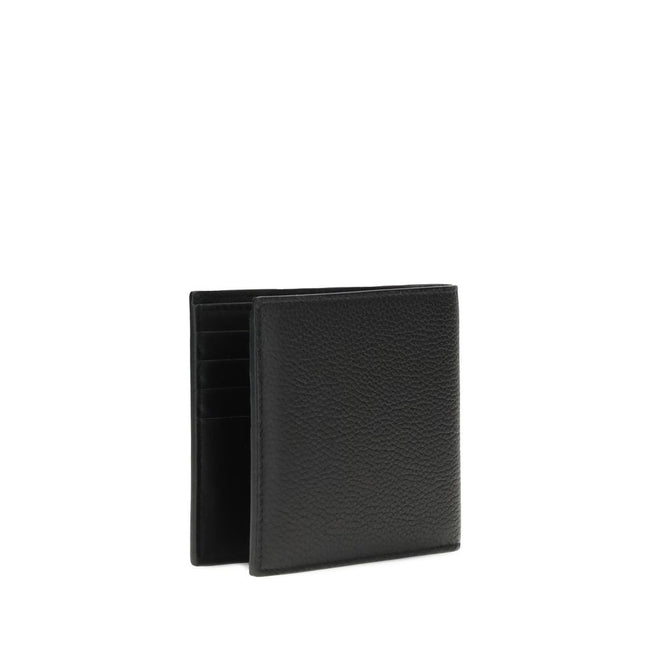Black Calf Leather Bos Taurus WalletEKD folding Wallet by Burberry combines functionality and style in a compact, refined design. Meticulously crafted, it features eight card slots, a large bill compartment with divider, and two handy slip pockets. The ha