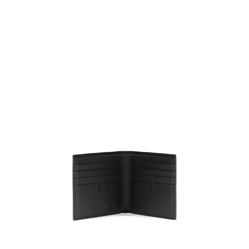 Black Calf Leather Bos Taurus WalletEKD folding Wallet by Burberry combines functionality and style in a compact, refined design. Meticulously crafted, it features eight card slots, a large bill compartment with divider, and two handy slip pockets. The ha