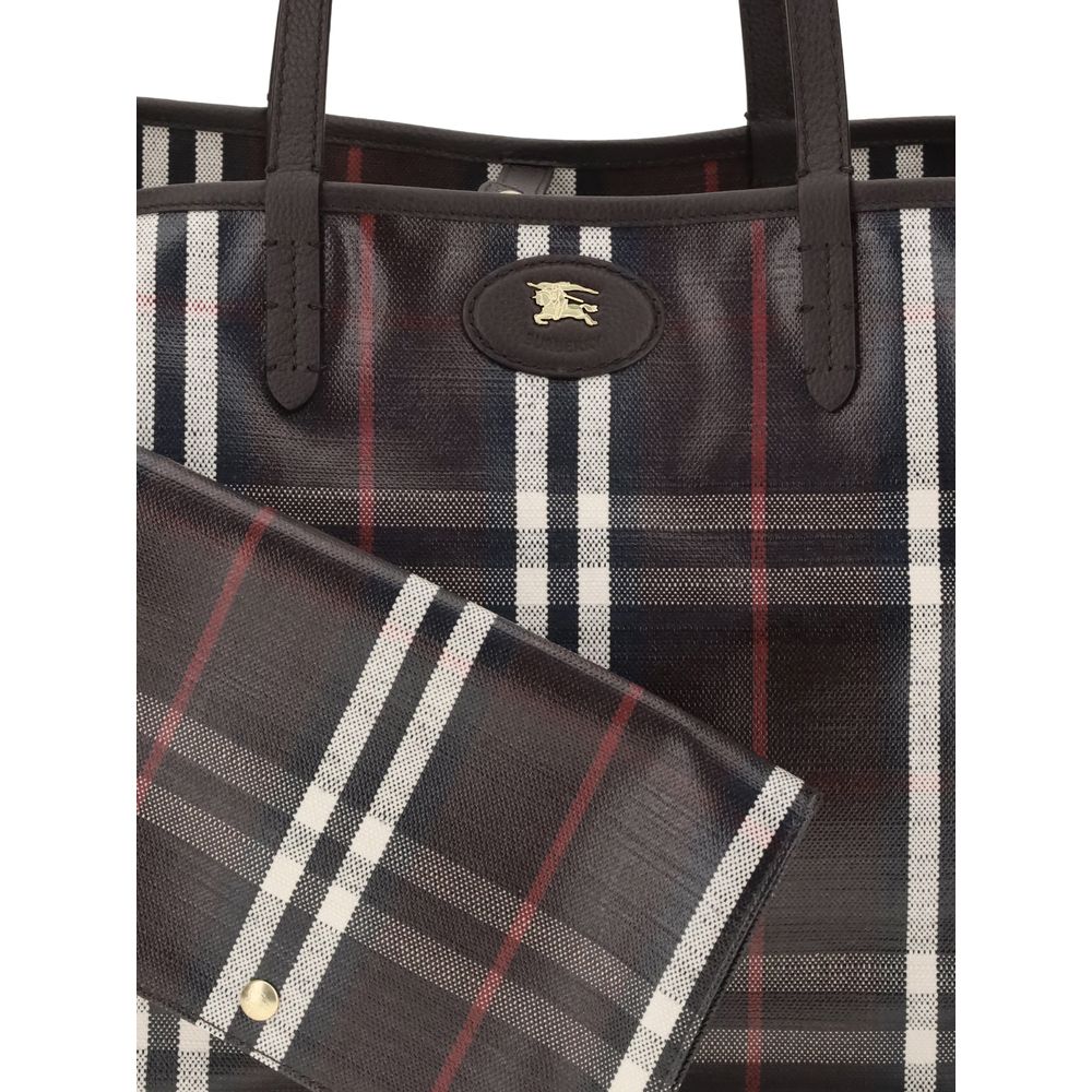Multicolor Cotton Shoulder BagMedium Highlands Tote Bag by Burberry is a capacious and sophisticated model designed for everyday elegance. Crafted with clean lines and unlined construction, it features leather top handles and a snap-button closure for dis